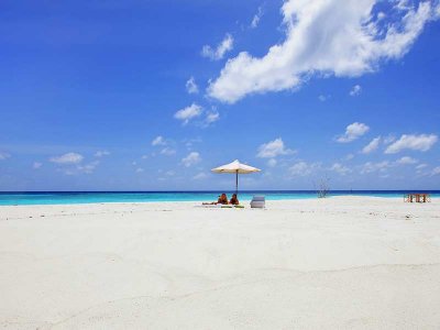 Six Senses Laamu Sunbathing